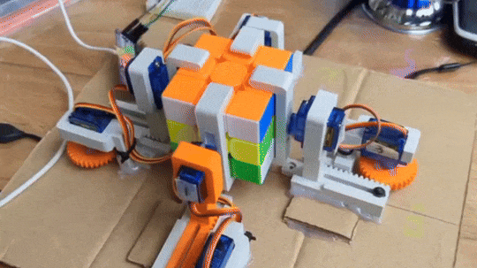 The cube being tilted forward by the servos.