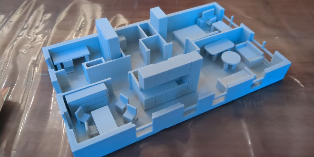 Picture of 3D printed scale model of an apartment.
